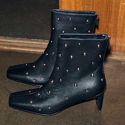 Black studded boots by NFD