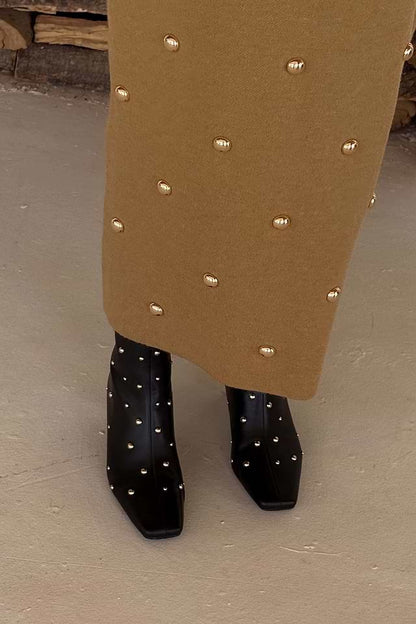 Black studded boots by NFD