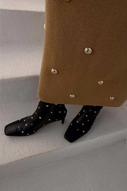Black studded boots by NFD
