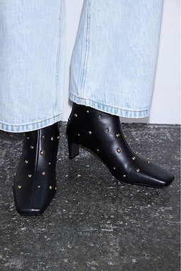 Black studded boots by NFD