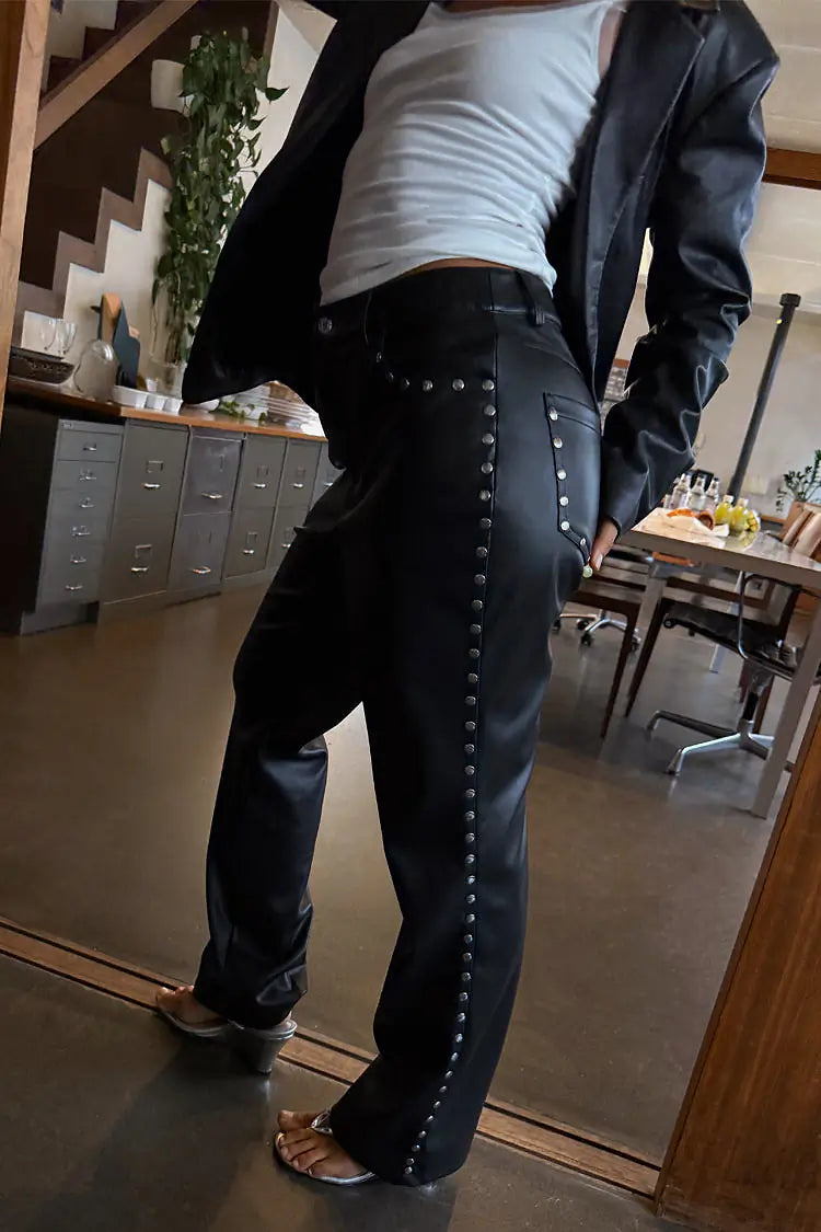 Black vegan studded leather trousers by NFD