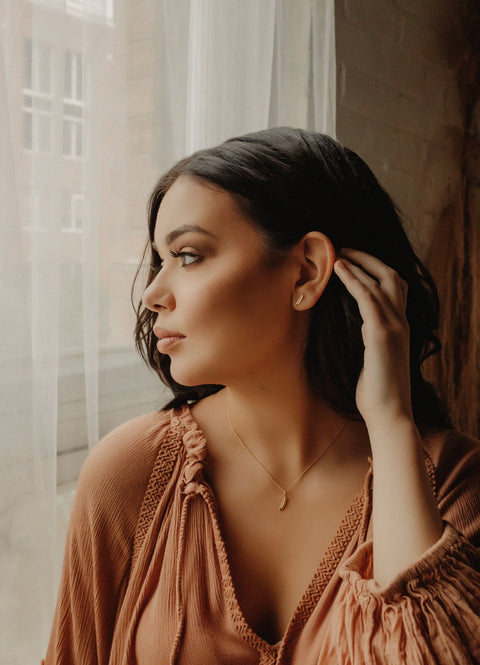 Feather Gold earrings